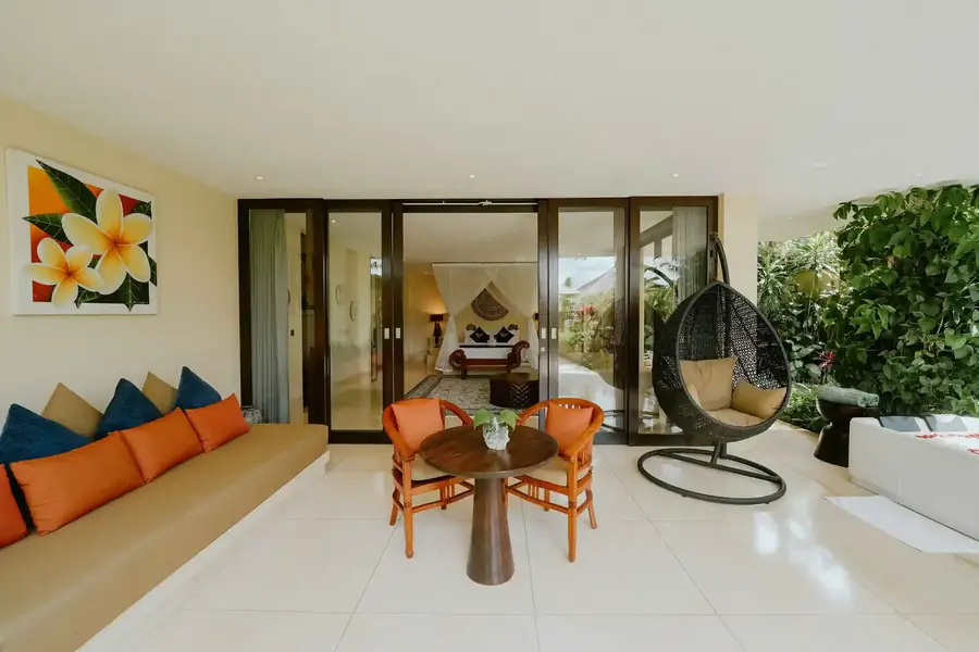 Bright villa suite opening onto a garden terrace